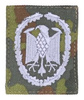 PATCH GENUINE GERMAN ACHIEVEMENT BADGE SILVER ON FLECKTARN CAMO FABRIC 55 x 45 MM